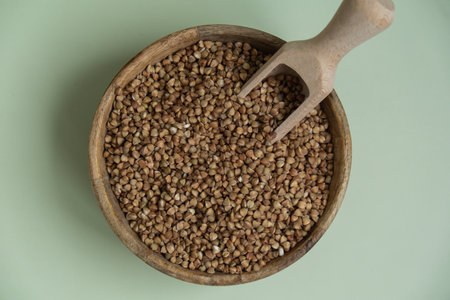 Raw buckwheat porridge Gluten free cereals. Health gut benefits. Concept of alternative whole spelt grain ingredient. Vegetarian diet recipes. Plant-based lifestyle. Copy space Protein richの写真素材