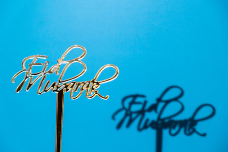 Traditional Islamic holiday greetings Eid Mubarak. Ramadan Kareem concept background. Creative light and shadows sunset lamp lantern. Muslim holiday poster Eid-Ul-Adha festivalの写真素材