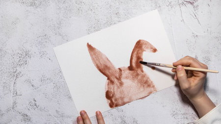 Drawing Easter rabbit bunny Storytelling of creating craft Easter greeting card holiday present. Tactile hand-on activity. Master class progress of creative me-made gifts. Seasonal domestic life micro moment hobbyの写真素材