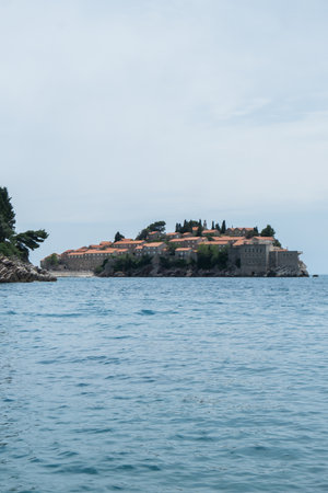 Sveti Stefan private island in Montenegro near Budva. Adriatic Sea Coast travel destination vacation holiday idea. Concept of getting away tourism experiences. Nature driven sceneryの写真素材