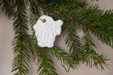 Snowman White air dry clay for making decor to Christmas tree holiday. Creating hobby recreation activity that involves fingers. DIY craftingの写真素材