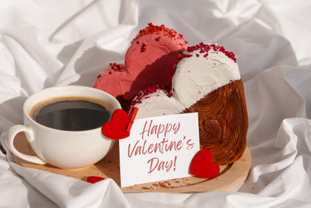 HAPPY VALENTINES DAY text message paper note card Morning breakfast celebration Delicious fresh variety croissants topped with colorful flavor Ganache. Creation unique heart shape bakery. Puff pastry holiday love gift present ideaの写真素材