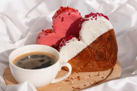 Morning breakfast in bed in wooden tray Present gift idea Valentines Day Holiday celebration Heart shaped croissants. Puff pastry new trendy sweet dessert bakery. Creamy doughの写真素材