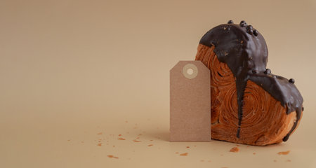 Empty paper note template greeting card mock up Delicious fresh croissant topped with Dark chocolate...