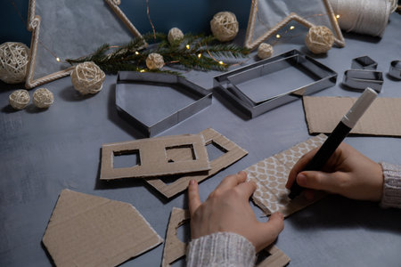 Cardboard paper Lantern House Sustainable Christmas preparation Diy process of making handmade. Step by step activity for children. Inclusive and responsible stress relief holiday hobbyの写真素材