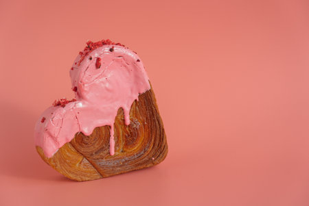 Valentines Day Birthday holiday present gift idea Coffee cappuccino latte beverage drink Morning breakfast Holiday birthday anniversary shiny candle sparkler on cake Delightful and vibrant heartshaped pastry croissant treat, beautifully topped with colorful frosting galore. Food experimentation dessert creative baking trendの写真素材