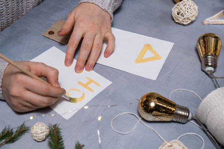 Gift Christmas idea. Do it yourself instruction postcard eco-friendly decoration. Making handmade presents childrens diy projects. Holiday family timeの写真素材