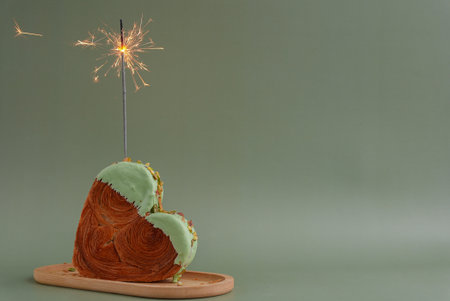 Shiny festive candle sparkler birthday celebration holiday Delightful and vibrant heartshaped pastry...