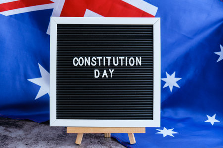Patriotic Australian flag and signage Australia constitution day. Concept of civil rights and law...