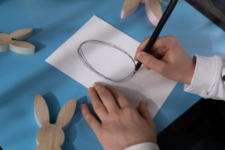 Making Easter egg from cotton rope and feather Gift Easter idea. Do it yourself instruction postcard...