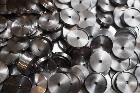 Close-up of abundance of new metal details produced in metal factory