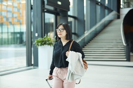 Horizontal portrait shot of young Asian woman sの写真素材