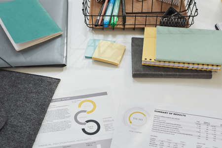 Close-up of business documents on workplace at officeの写真素材