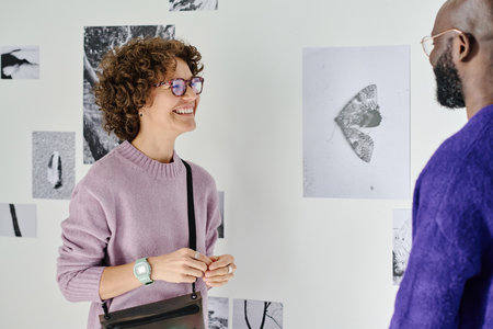 Friends talking to each other during their meeting at art gallery