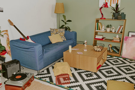 High angle shot of modern living room full of interior itemsの写真素材