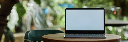Website banner with broken laptop on wooden tableの写真素材