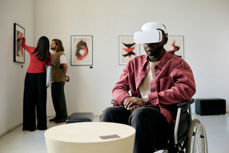 Man wearing VR headset sitting in wheelchair in art gallery, immersed in virtual experience while...