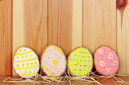 Easter funny cookies over wood 