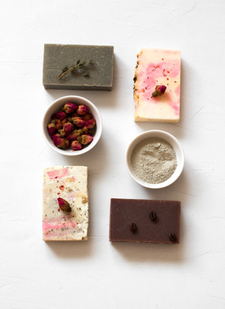 Set of hand made bars of soap on white background. Flat layの写真素材
