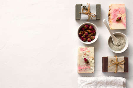 Set of hand made bars of soap on white background. Flat lay. Copy space