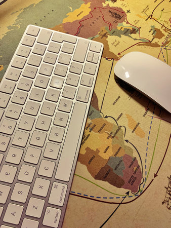 white keyboard, white computer mouse, mouse pad, computer equipment
