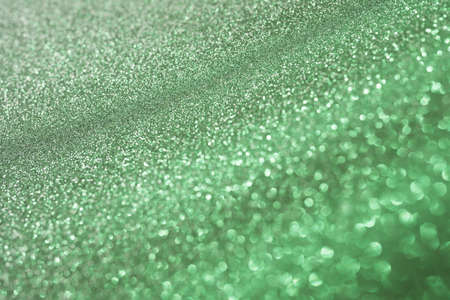Green sparkling abstract background festive conceptの写真素材