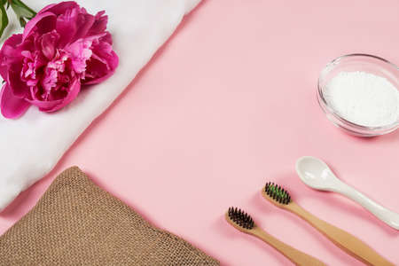 Eco-friendly bamboo toothbrushes,tooth powder, linen cloth on a background. Zero waste concept....