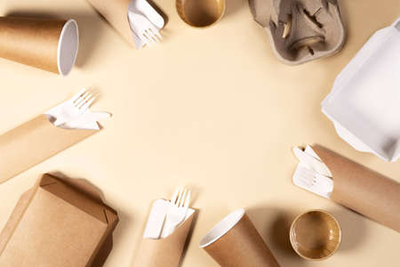 Eco-friendly paper tableware. Dishes, paper cups, fast food containers and cutlery. Recycling or environmentally friendly concept. Zero waste conceptの写真素材