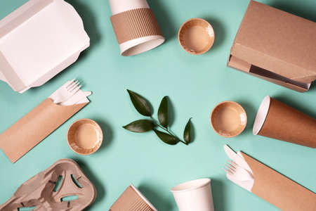Eco-friendly paper tableware. Dishes, paper cups, fast food containers and cutlery. Recycling or environmentally friendly concept. Zero waste conceptの写真素材