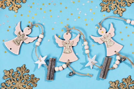 New Years composition. Christmas colorful shiny decorations Christmas tree on a light background.の写真素材