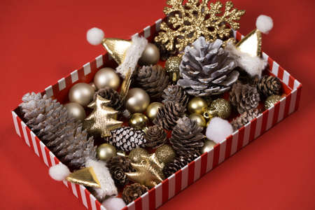 New Years composition. Christmas colorful shiny decorations Christmas tree on a light background.の写真素材