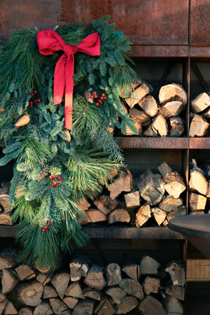 Shelves with neatly stacked chopped firewood. Preparing firewood for the winter. energy crisisの写真素材