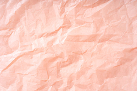 Pink background wrapping paper with crumpled texture. background for your designの写真素材