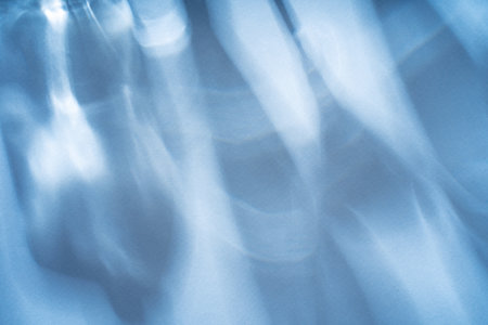 Abstract shadow sun glare from glass and leaves, empty background composition for product...