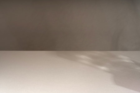 Empty background composition for product presentation. Sunny shadows of different colors empty beige...