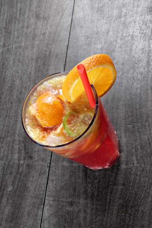 Refreshing lemonade on wooden table closeupの写真素材