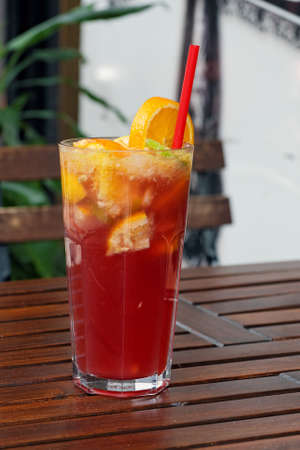 Refreshing lemonade on wooden table closeupの写真素材