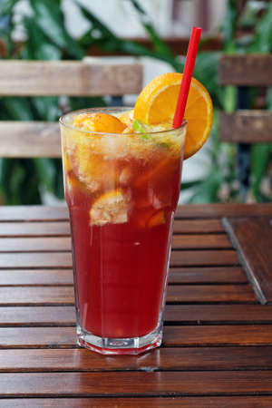 Refreshing lemonade on wooden table closeupの写真素材