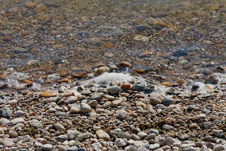 Some stones at the shore closeupの写真素材