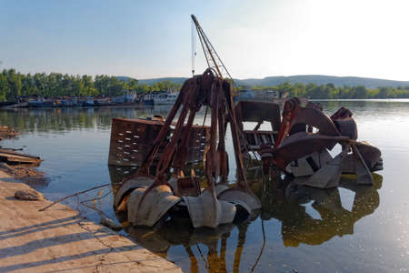 Metal scrap in the water closeupの写真素材