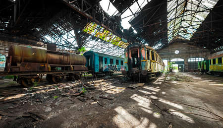 Some trains at abandoned train depotのeditorial素材