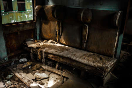 Abandoned carriage interior with seats closeupの写真素材