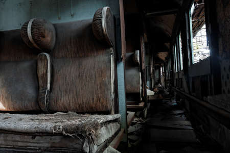 Abandoned carriage interior with seats closeupの写真素材