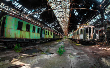 Old trains at abandoned train depotのeditorial素材