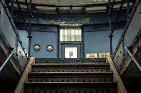 Closeup photo of industrial stairs indoorsの写真素材