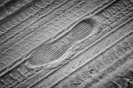 Print of a shoe in the sand closeupの写真素材