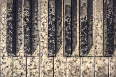 Close up of old dirty pianoの写真素材