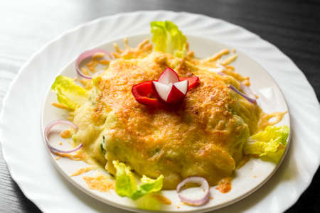 Delicious food on white plate close upの写真素材