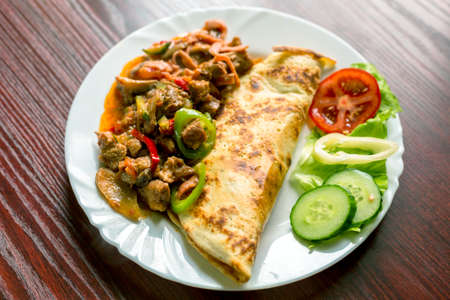 Delicious food on white plateの写真素材