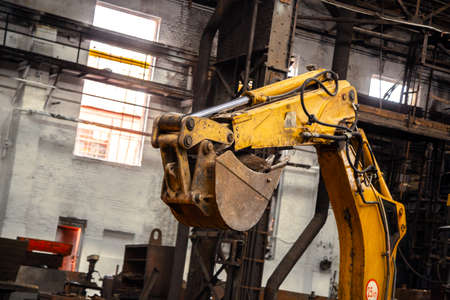 Industrial interior with bulldozer insideの写真素材